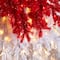 9ft. Pre-Lit Holiday Red Santa Hat Artificial Christmas Tree, White LED Lights